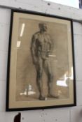 20th century Russian School, a study of a standing male figure, charcoal.