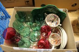 Cranberry and green glassware and decorative china.