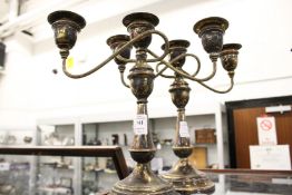 A pair of plated three light candelabra.