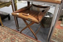 A butler's style tray top table.