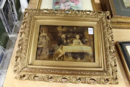 A crystoleum of a couple seated at a table.