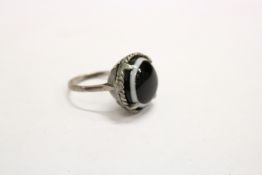 A large decorative Islamic dress ring.