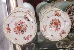 A set of five porcelain plates decorated with flowers in the Imari palate.