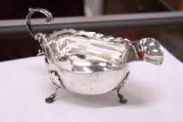 A silver sauce boat.