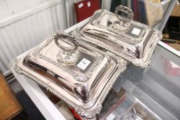 A good pair of plated entree dishes with covers and handles, each with an engraved armorial.