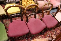 Three Victorian mahogany balloon back dining chairs.