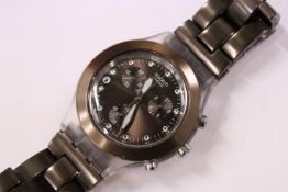 A gentlemen's Swatch watch.