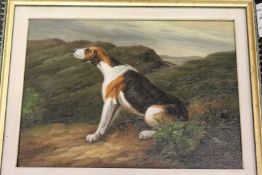 A small oil painting of a seated hound.
