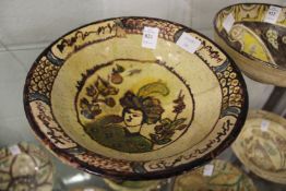 An early Islamic painted pottery bowl.