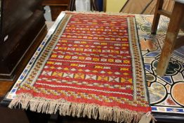 A small Persian rug.