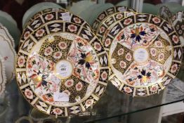 A set of six Imari decorated plates in the Crown Derby style.