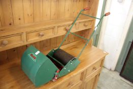 A child's Webb cylinder lawn mower.