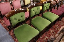 Three Victorian mahogany dining chairs.