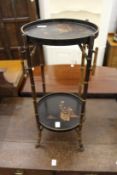 A Chinese bamboo and lacquer two tier occasional table.