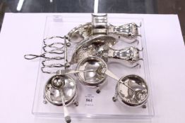 Three circular silver salts, an oval pedestal dish with engraved decoration and other small silver