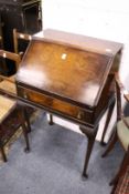 A small walnut bureau.