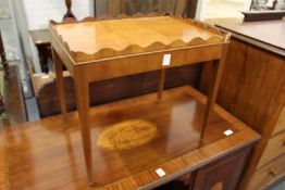 A yew wood occasional table.