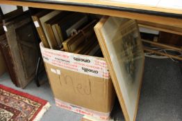 A quantity of paintings and prints.