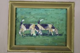 A small oil painting of two dogs in a decorative gilt frame.
