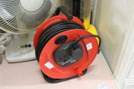 An electrical cable extension reel.