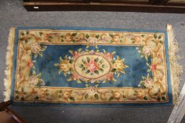 A blue ground Chinese rug.