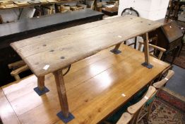 A continental rustic oak plank top low table.