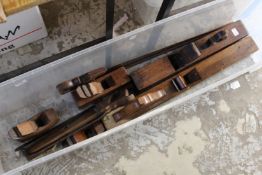 Old woodworking planes and saws.