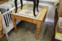 A pine kitchen table.