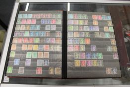 Stamps, a red stock book containing GB, Decimal, Mint including HV.