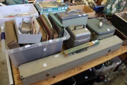 An old Bell & Howell projector with other related items.