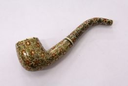 A decorative eastern pipe.