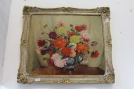 Alix Jennings, a still life of flowers in a jug, oil on canvas, in a decorative frame.