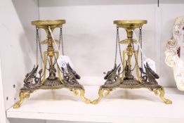 A good pair of decorative ormolu and silver plated stand modelled in the classical style.