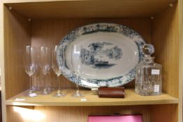 A large meat plate, a cut glass decanter, champagne flutes and a hip flask.