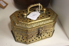 An eastern metal spice box.