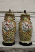 A large pair of Chinese porcelain lamps.