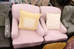 A pair of modern Howard style armchairs.
