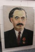 Russian School, a bust length portrait of a gentleman wearing a medal Order of Lenin, oil on canvas,