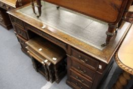 An oak pedestal desk.