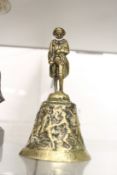 A small cast brass bell, the handle modelled as Napoleon.