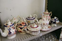 Victorian and later lustre decorated teapots, sucriers etc.