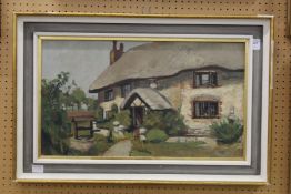 Modern British, an oil of a country cottage, signed D.R.G., oil on board.