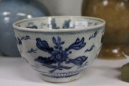 A small Chinese blue and white bowl.