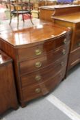 A 19th century mahogany bow front chest of two short and three long graduated drawers on bracket