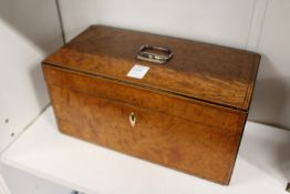 A 19th century satinwood two division tea caddy with mixing bowl.
