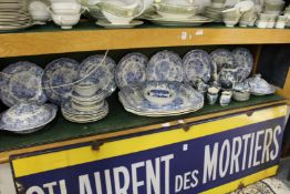 A good collection of blue and white china to include three large meat dishes.