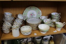 Two part sets of floral decorated china.