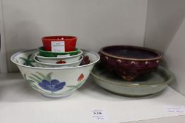 A quantity of Chinese bowls and brush washers.