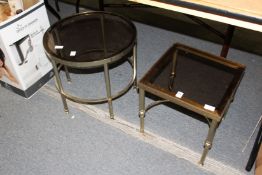 Two brass and glass occasional tables.
