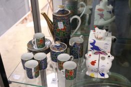 Villeroy & Boch, a pair of amusing cat salt and peppers, together with a matching teapot and a